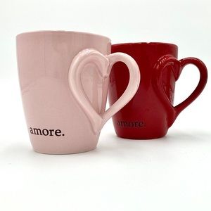 Set of 2 Starbucks “amore” mugs, one pink and one red